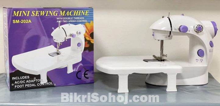 mini sewing machine. mini sewing machine